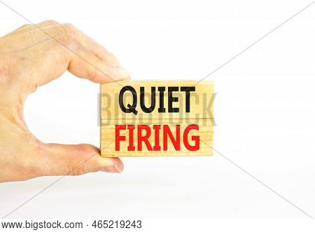 Quiet Firing Symbol. Concept Words Quiet Firing On Wooden Blocks. Beautiful White Table White Backgr
