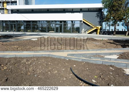 Construction Of A Park Path. Borders Along The Park Path, Drip Irrigation System For Irrigating The 