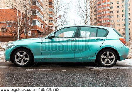 Moscow, Russia - February 2022: Car Bmw 1 Series F20 On The Urban Parking, Side View