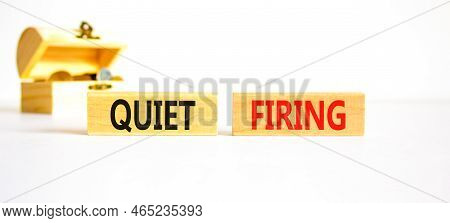 Quiet Firing Symbol. Concept Words Quiet Firing On Wooden Blocks. Beautiful White Table White Backgr