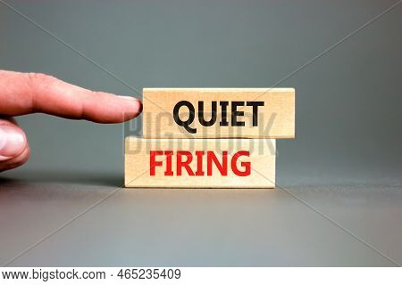 Quiet Firing Symbol. Concept Words Quiet Firing On Wooden Blocks. Beautiful Grey Table Grey Backgrou