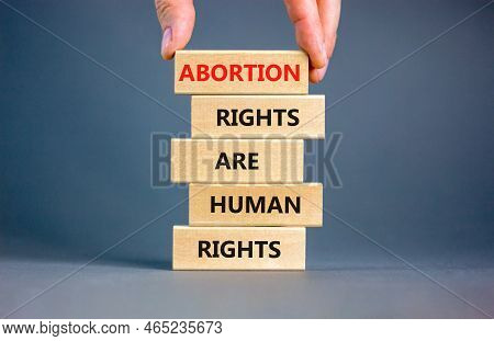 Abortion Rights Symbol. Concept Words Abortion Rights Are Human Rights On Wooden Blocks. Businessman