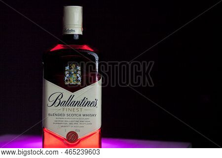 Ballantines Whiskey Bottle With Colorful Lights Background In Bar. Ballantines Concept. Whiskey Conc