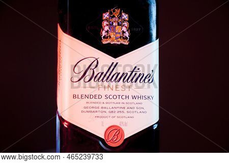 Ballantines Whiskey Bottle With Colorful Lights Background In Bar. Ballantines Concept. Whiskey Conc