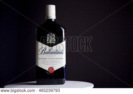 Ballantines Whiskey Bottle With Colorful Lights Background In Bar. Ballantines Concept. Whiskey Conc
