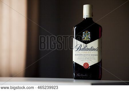 Ballantines Whiskey Bottle With Colorful Lights Background In Bar. Ballantines Concept. Whiskey Conc