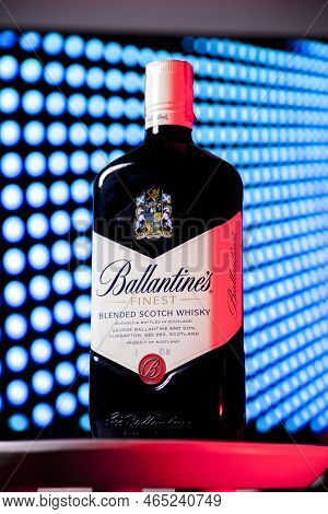 Ballantines Whiskey Bottle With Colorful Lights Background In Bar. Ballantines Concept. Whiskey Conc