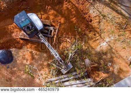 During Landscaping Work With Tractors Skid Steers Several Sections Of Land Had Been Cleared Trees Ro