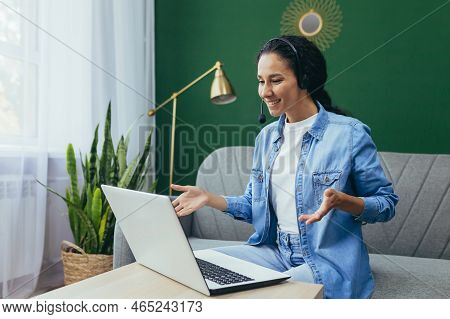 Happy Hispanic Woman At Home Working Remotely From Home, Customer Service Online Store Tech Support 