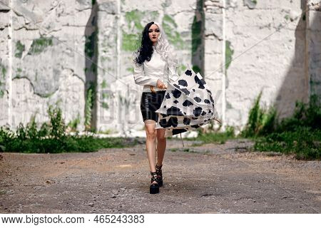 Cosplay On Cruella De Vil With A Dalmatian