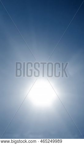 Blurred Background. Sun In Sky. Bright Sun With Sunbeams Shines On Clean Blue Sky. Bright Sun Light,