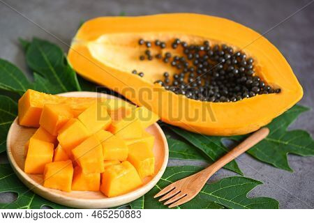 Papaya Fruits On Dark Backgroud, Fresh Ripe Papaya Slice Cut In Half Tropical Fruit With Papaya Seed