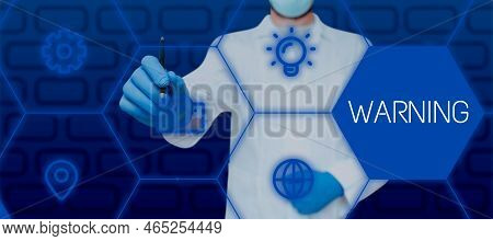 Handwriting Text Warning. Business Concept Statement Or Event That Indicates A Possible Or Impending