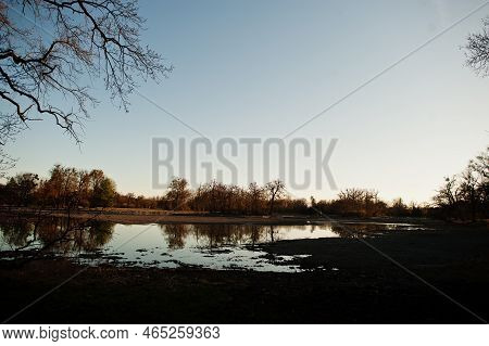Dry Cracked Soil On The Drying Up Watering Place On Lednice In South Moravia, Czech Republic, Europe