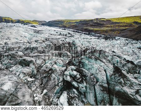 Dirt Covered Ice On The Glacier In Iceland