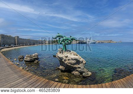 Rhodes, Greece - June 30, 2022: Delphinia Statue, Sculpture Of Dolphins, Located At Akti Sachtouri S