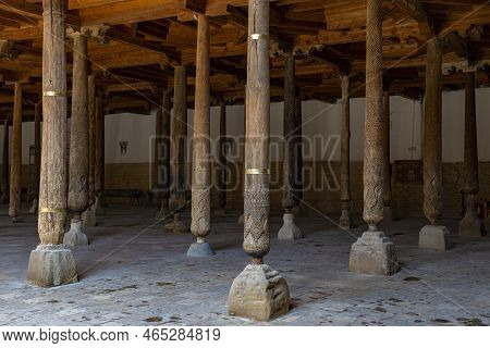 Ancient Carved Wooden Columns In The Medieval Juma Mosque. Khiva, Uzbekistan