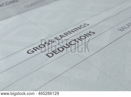 A Concept Showing The Earnings And Deductions Section Of A Typical Employment Paycheck Slip  - 3d Re