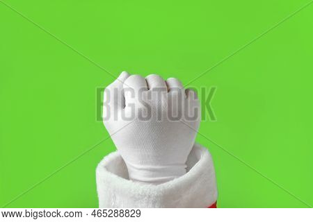 Gestures Pack. Santa Claus Hand In White Gloves Knocking Isolated On Chroma Key Green Screen Backgro