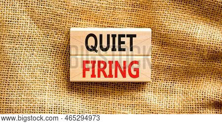 Quiet Firing Symbol. Concept Words Quiet Firing On Wooden Blocks. Beautiful Canvas Table Canvas Back
