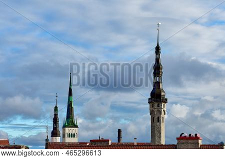 Skyline Of Old Tallinn, Three Towers. Three Steeples Over The Roofs Of The Famous Capital Of Estonia