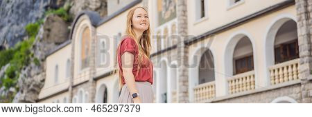 Banner, Long Format Woman Tourist In Monastery Of Ostrog, Serbian Orthodox Church Situated Against A