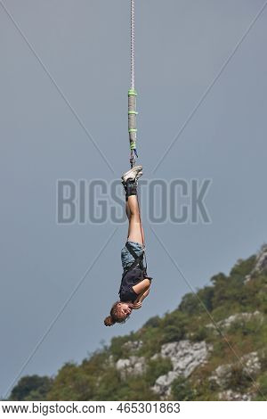 Bungee Jumping Girl Hanging On The Rope Screaming In Excitement