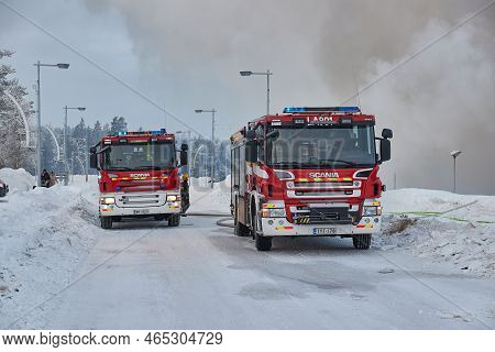 Saariselka, Finland - Circa 2022: Fire Trucks At A Burning Down Of Shopping Center Kuukkeli In Finni