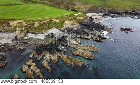 Rocks On The Irish Coast, Top View. The Coast Of The Atlantic Ocean. Nature Of Northern Europe. Rock