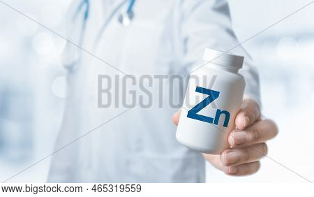 Zinc Zn, Zn Supplements For Human Health. Doctor Recommends Taking Zn. Doctor Gives Zinc Vitamin. Es