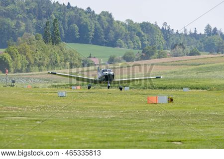 Lommis, Switzerland, May 11, 2022 Piper Pa28-181 Archer Iii Propeller Plane Is Departing From A Smal