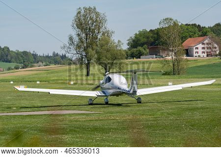 Lommis, Switzerland, May 11, 2022 Diamond Da40d Propeller Plane Is Taxiing On The Grass On A Small A