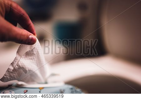 Disposable Wipes Being Flushed Down A Toilet Where They Can Cause Clogging And Problems With Wastewa