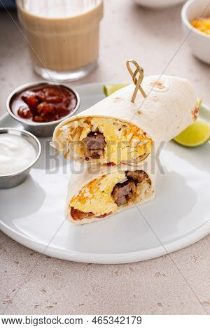 Breakfast Burrito With Sausage, Eggs, Hashbrown And Cheese