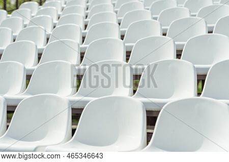 Seats Of Tribune On Sport Stadium. Concept Of Fans, Chairs For Audience, Cultural Environment Concep