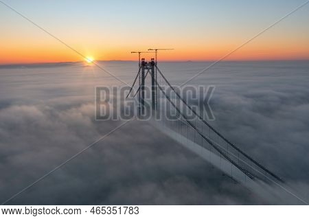 Panoramic Aerial Drone View From Above Of The Suspended Bridge Over Danube River, Under Construction