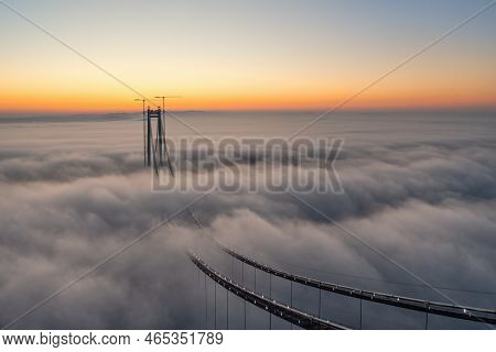 Panoramic Aerial Drone View From Above Of The Suspended Bridge Over Danube River, Under Construction