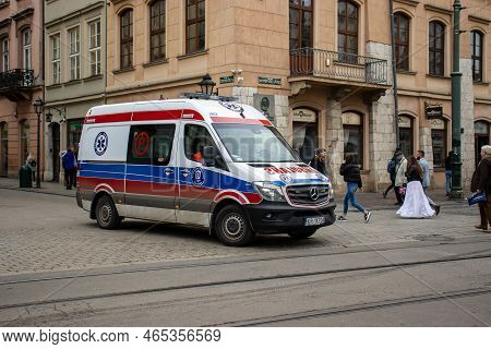 Cracow, Poland, October 1, 2022: Ambulance Driving In The City Center Of Krakow.