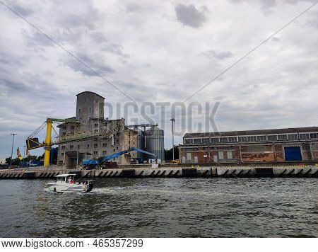 Gdansk Poland, July 18, 2022: Container Ships In Commercial Harbour. Harbour In Gdansk. Iindustrial 
