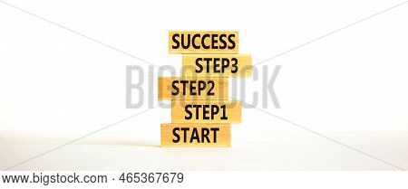 Strat, Step And Success Symbol. Concept Words Start Step 1 2 3 Success On Wooden Blocks On A Beautif