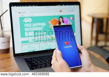 Chiang Mai, Thailand, Jul 09 , 2022 - Woman Holding A Mobile Phone To Use Lazada App To Shop Online