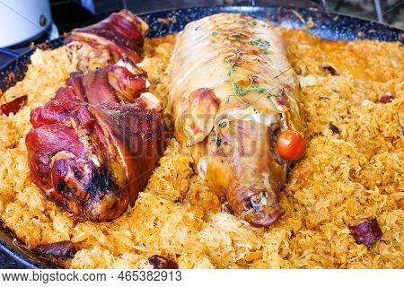 Delicious Grilled Piggs On Cabbage. Unhealthy Eating