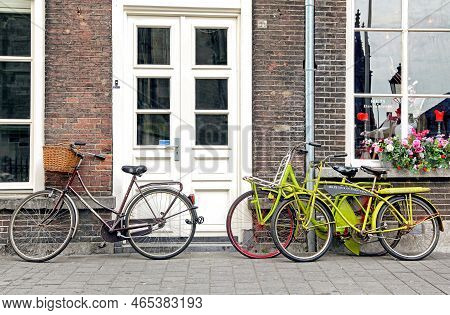 S Hertogenbosch, Netherlands  - April 1, 2014: Bicycles In Front Of House At City 's-hertogenbosch