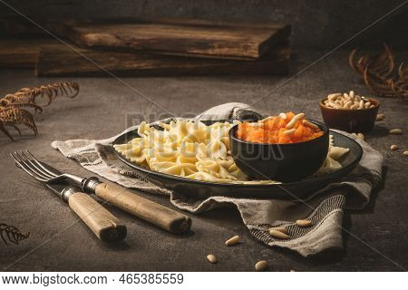 Farfalle Pasta With Pumpkin Puree And Pine Nuts