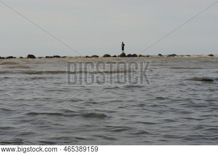 Shot Of Waves On The Kartini Beach, Rembang, Central Java, Indonesia. Sea Stock. Looks Like A Fisher