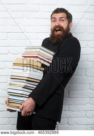 Funny Teacher Or Professor With Book Stack. Thinking Serious Mature Teacher. Mature Professor, Middl