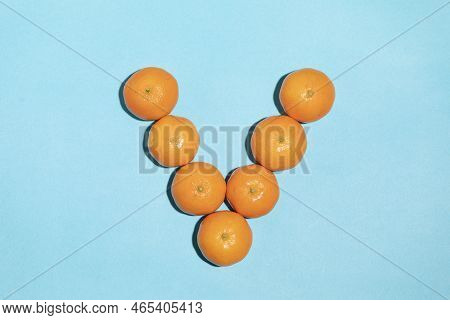 Juicy Natural Tangerines Forming The Letter V