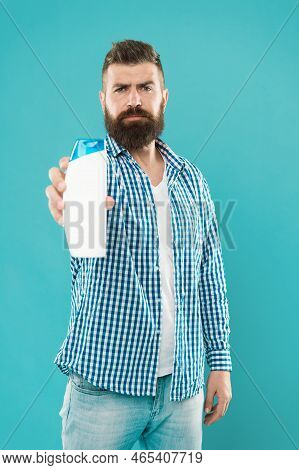 Hair Care. Shampoo For Daily Use. Body Care Cosmetic Bath Shower. Man Hold Shampoo Bottle. Shampoo A