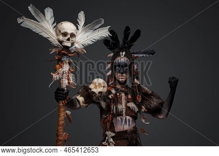 Powerful Female Necromancer With Staff And Painted Face