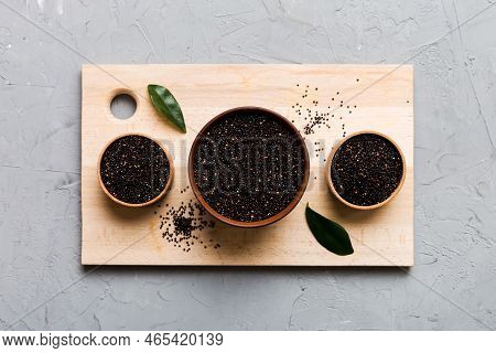 Quinoa Seeds In Bowl On Colored Background. Healthy Kinwa In Small Bowl. Healthy Superfood.